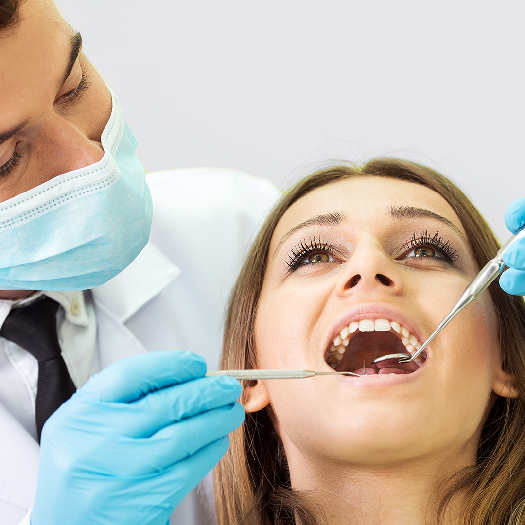 Image of a woman getting a dental examination