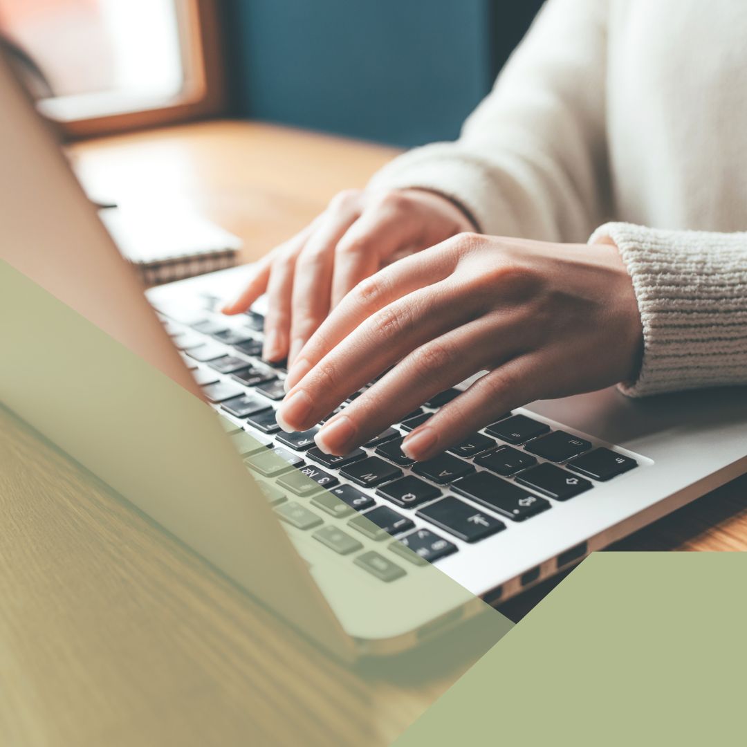 researching on a laptop