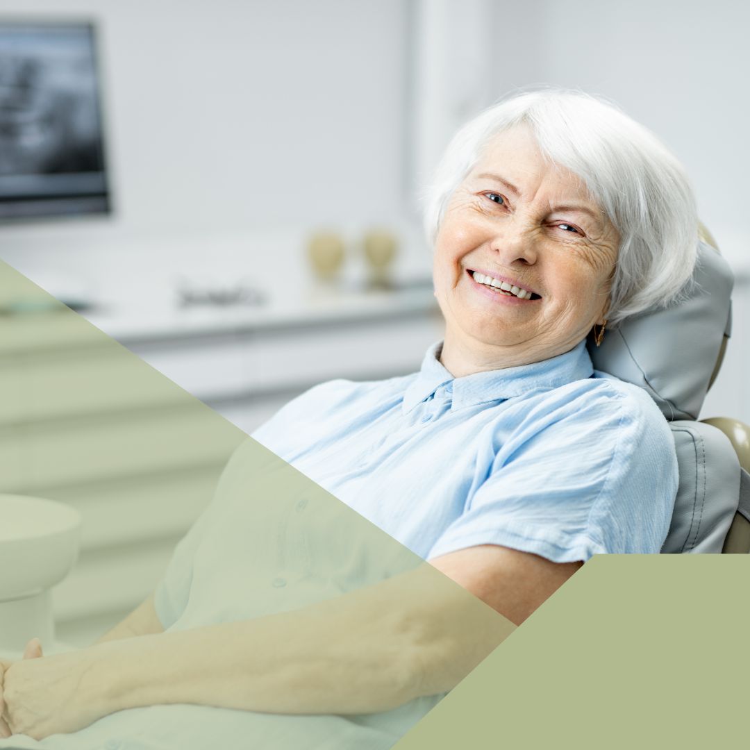 older woman smiling in dental chair