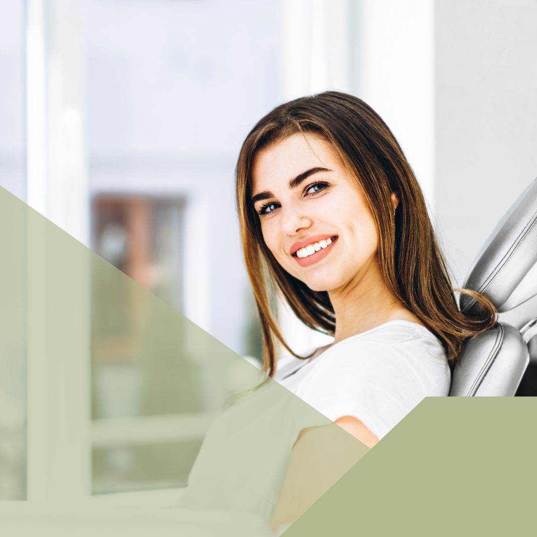 smiling woman in dental chair