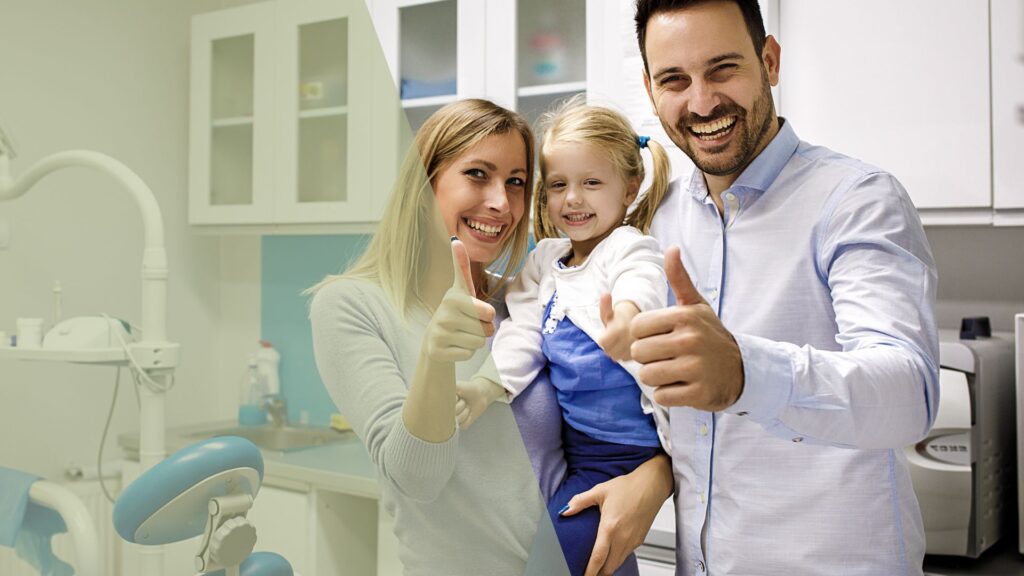 smiling family at dental office