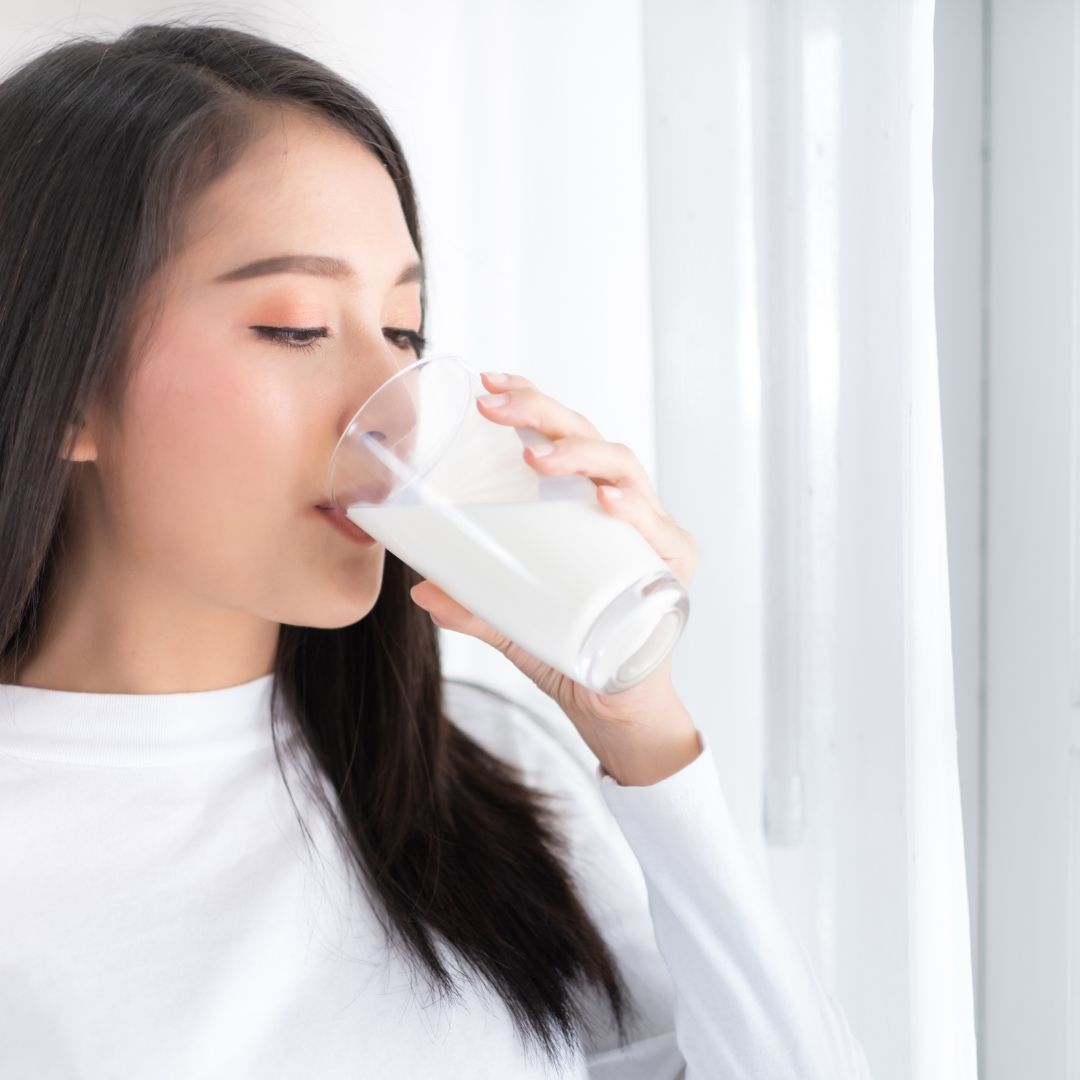 woman drinking milk