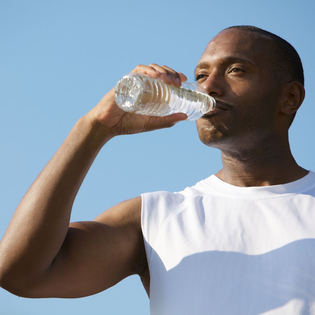 man drinking water