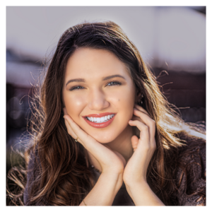 woman smiling.