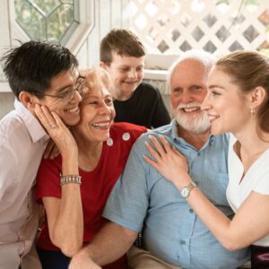 family members together hanging out and laughing