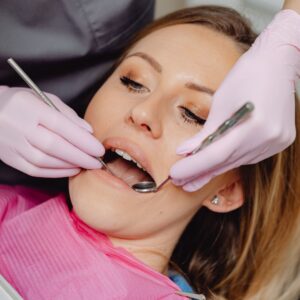 woman getting her teeth cleaned