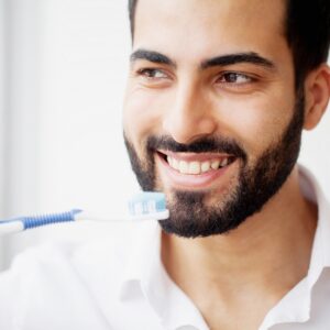 Man brushing his teeth